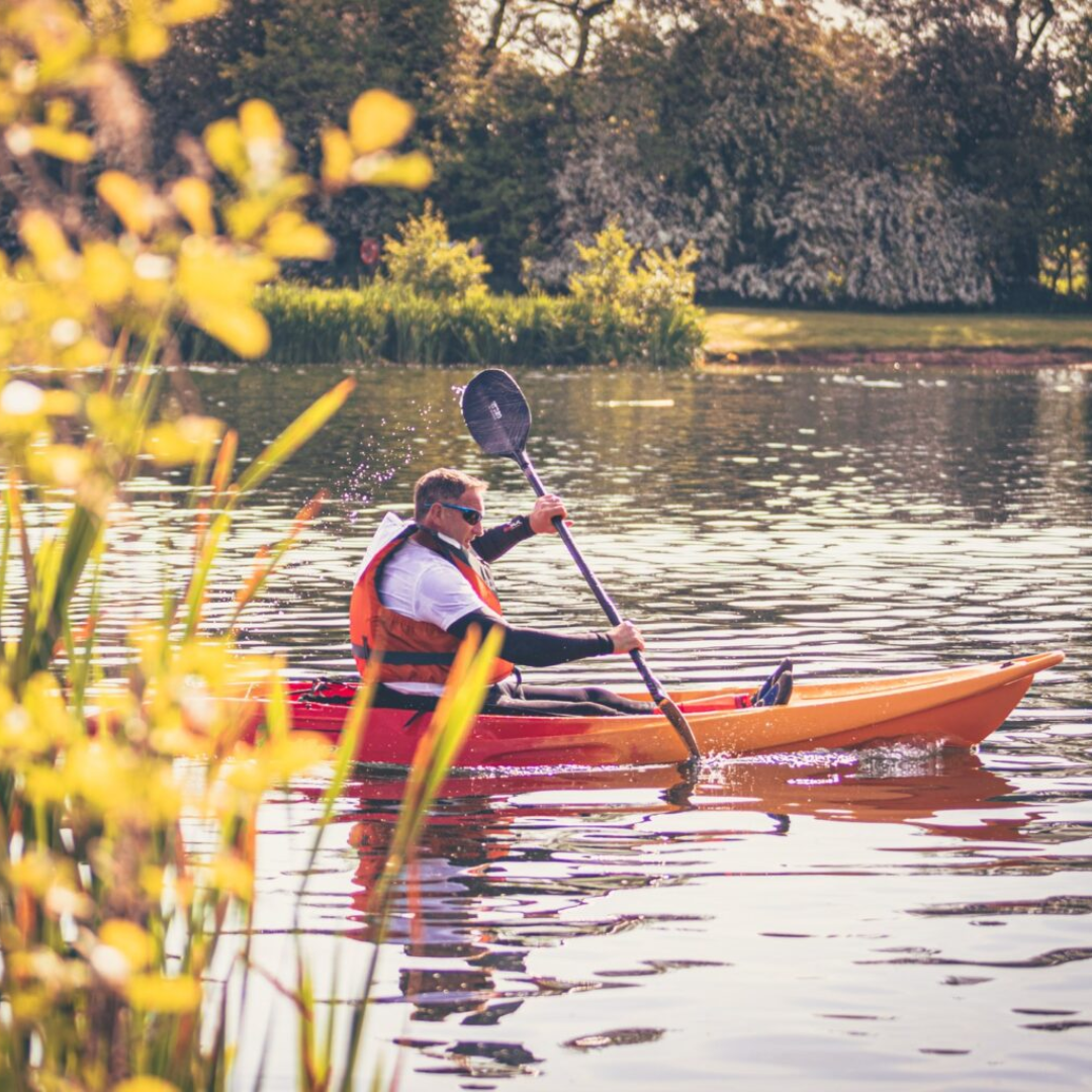 Man in canoe on river